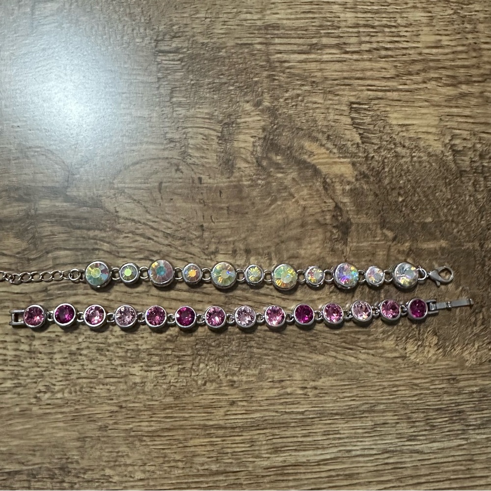 2 silver bracelets. Excellent condition.